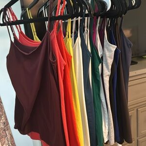 10 small and 10 medium loft tanks in various colors selling all together